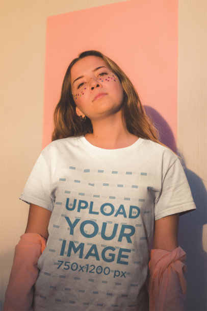 Mockup of a Woman Wearing a T-Shirt with Star Confetti on Her Face
