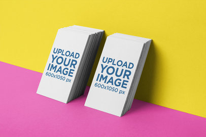 Business Card Mockup of Two Vertically Stacked Sets Leaning Against a Wall 21954