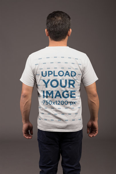 Back Shot Tee Mockup of a Man with a Grey Background