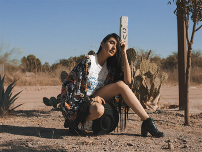 Tshirt Mockup of a Woman Posing in a Desert