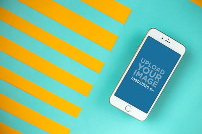 Mockup of a Gold iPhone 8 Plus Over a Turquoise Background with Orange Stripes 21638