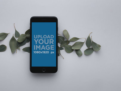 Space Gray iPhone 8 Plus Mockup Over Leaves