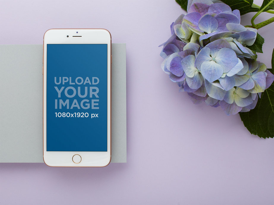 Gold iPhone Mockup Next to Hydrangea Lilac Flowers