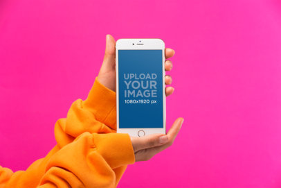 iPhone 8 Plus Mockup In Front of a Hot Pink Background