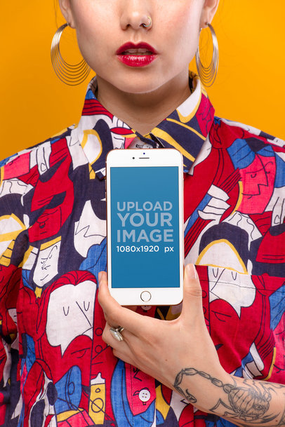 Mockup of a Gold iPhone 8 Held by a Woman Wearing a Colorful Patterned Shirt  21962