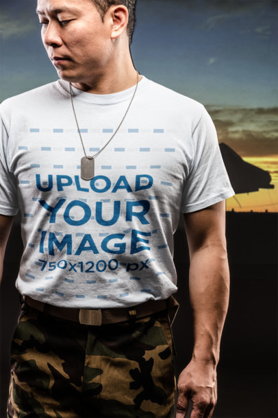 T-Shirt Mockup of a Veteran Man Somberly Looking Down 