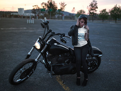 Tshirt Mockup of a Biker Woman Leaning Against her Chopper