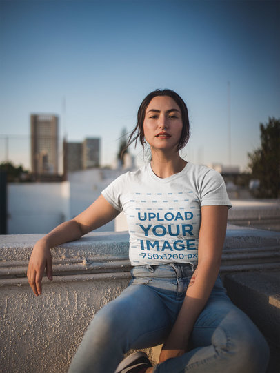 T-Shirt Mockup of a Woman in a City Setting
