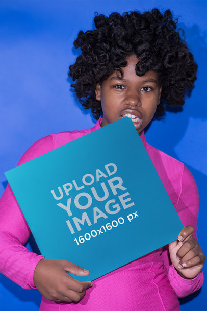Mockup of a Girl Biting the Corner of a Vinyl Album Cover 22110