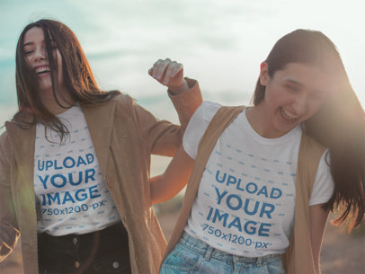 T-Shirt Mockup Featuring Two Laughing Women