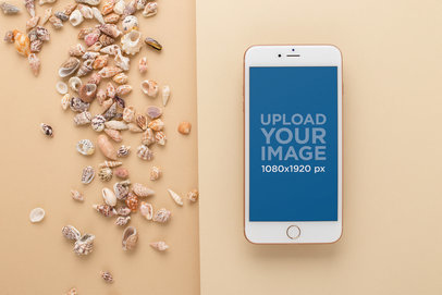 Gold iPhone 8 Plus Mockup Next to Seashells