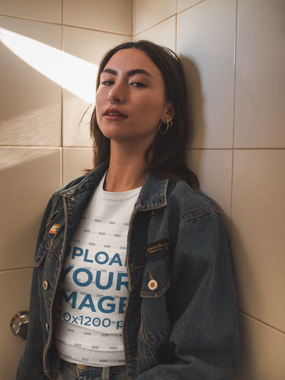 Mockup of a Woman Wearing a T-Shirt and an Oversized Jean Jacket