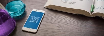 White iPhone 6 Lying on Top of a Chemistry Lab Table