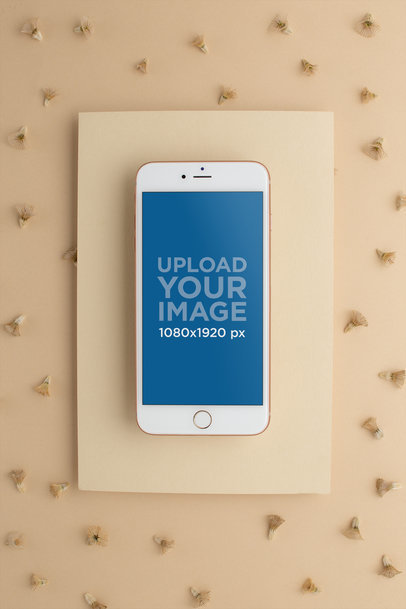 Gold iPhone Mockup Lying on a Rectangular Cardboard Surface 22017