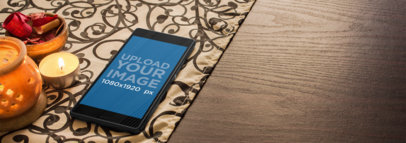 Android Mockup of a Sony Xperia Z3 Lying on Top of a Dark Wooden Table