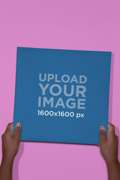 Mockup Featuring the Hands of a Person Holding a Vinyl Record Cover 22117