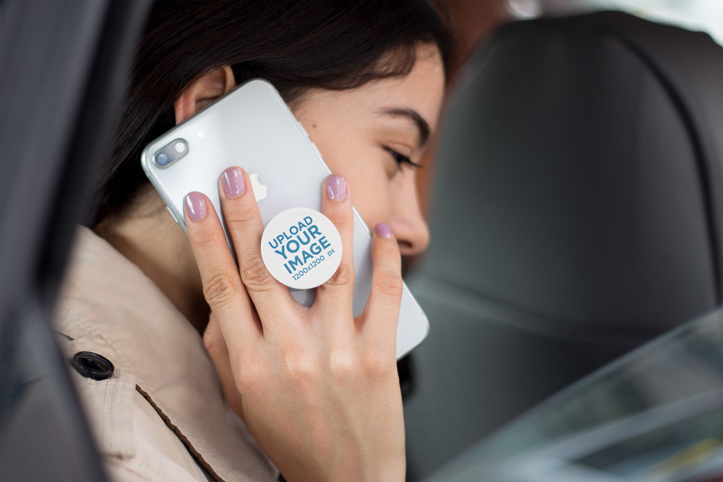 Phone Grip Mockup Featuring a Woman Calling with an iPhone 8 Inside a Car 