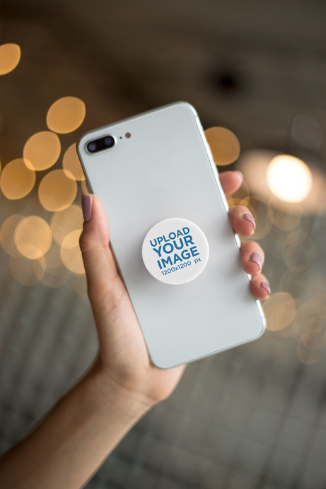 Phone Grip Mockup with String Lights in the Background