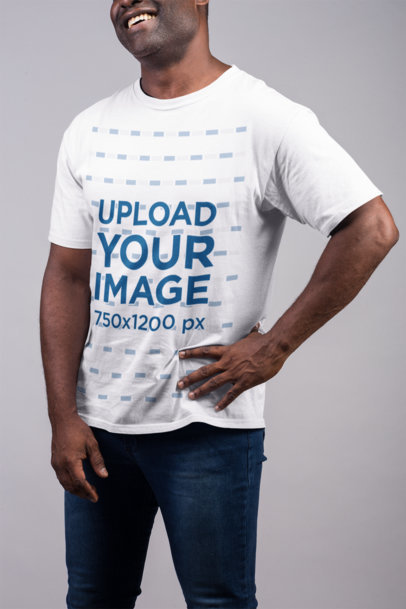Crew-Neck Tee Mockup Featuring a Senior Man Laughing Against Flat Background