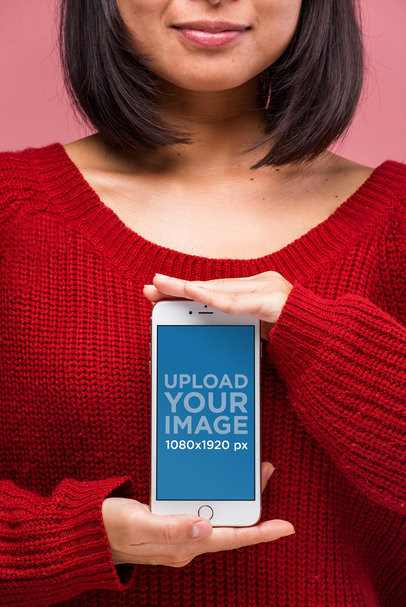 Gold iPhone 8 Plus Mockup Featuring a Woman in a Bright Red Sweater