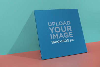 Vinyl Album Cover Mockup Lying Against a Two Color Background