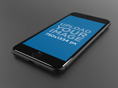 Space Gray iPhone 8 Mockup Lying on a Dark Gray Surface 