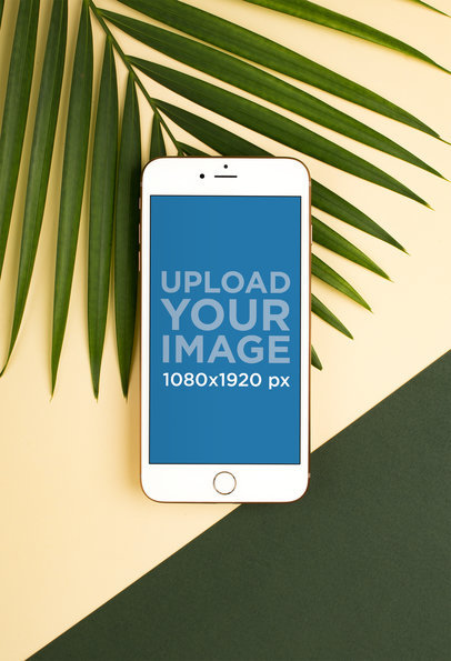 Mockup of a Gold iPhone 8 Plus Over Green and Light Yellow Tones
