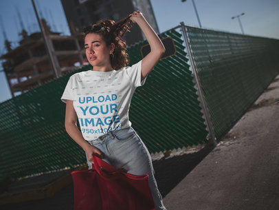 T-Shirt Mockup of a Woman in a Construction Zone