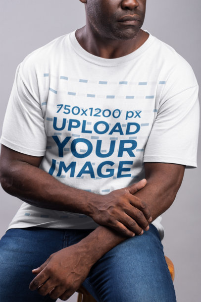 Mockup of a Man Wearing a T-Shirt With Jeans