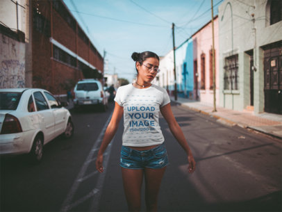 T-Shirt Mockup of a Woman Holding Out Her Arms
