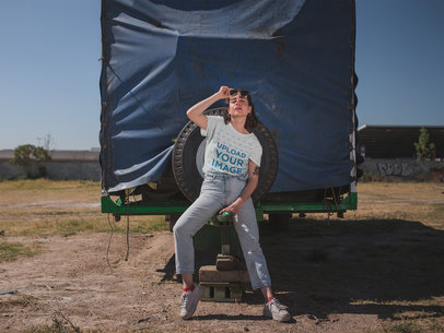 Tshirt Mockup Featuring a Girl in a Vintage Outfit Leaning Against a Truck 20043