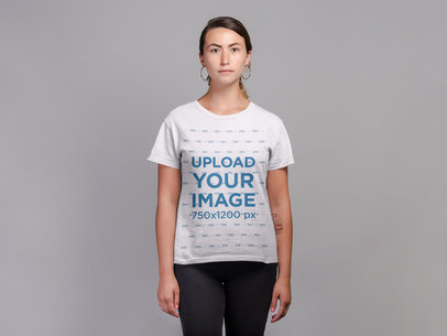 Mockup of a Woman Wearing a T-Shirt and Hoop Earrings