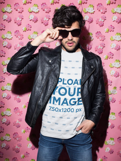 Crewneck Tee Mockup of a Man with a Leather Jacket Against a Pink Wall with a Print of Flowers  18753