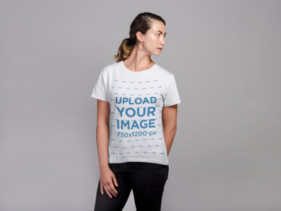 Crew-Neck Tee Mockup Featuring a Young Woman Posing in Studio