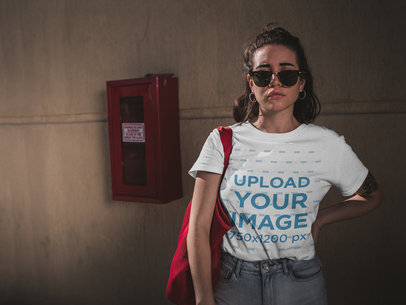 T-Shirt Mockup of a Woman in Front of a Fire Extinguisher  20014