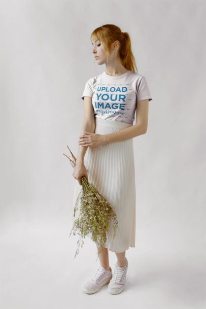 T-Shirt Mockup Featuring a Strawberry Blonde Woman