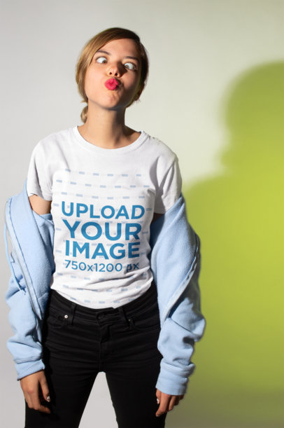 Mockup of a Woman Wearing a T-Shirt and Puckering Her Lips
