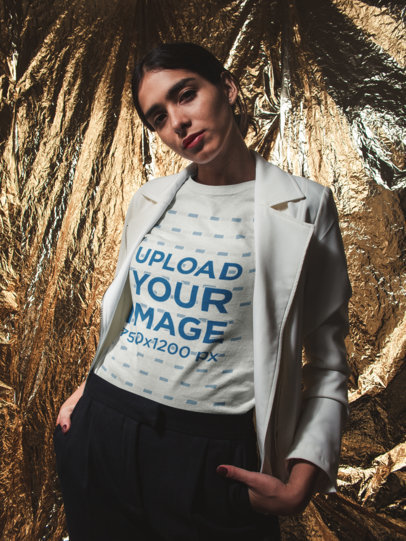 T Shirt Mockup of a Stylish Woman Against a Gold Background 