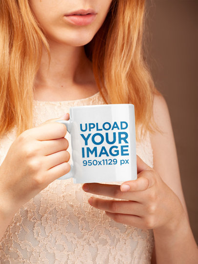 Mockup of a Woman Holding a Coffee Mug 