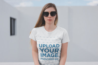 Tshirt Mockup of a Serious Blonde Woman with Blurry Background