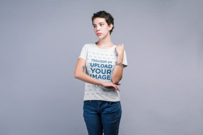 Mockup of a Woman Wearing a T-Shirt and Pensively Looking Away 21792
