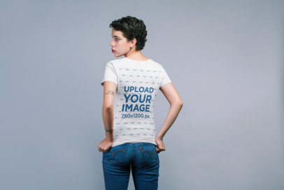 Back Shot Mockup of a Woman Wearing a T-Shirt and Pulling it Down