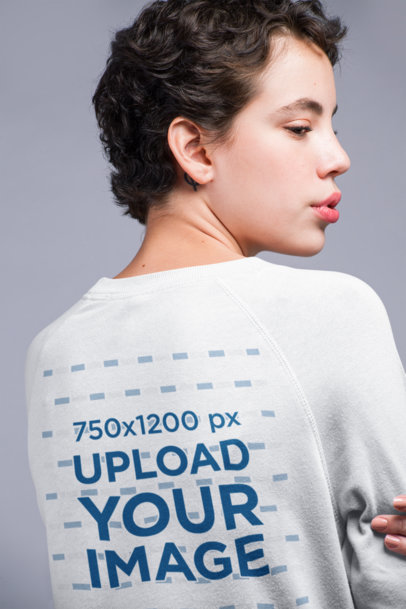 Back Shot Sweatshirt Mockup of a Woman Slightly Pouting Her Lips 21803