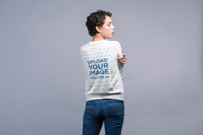 Back Shot Sweatshirt Mockup Featuring a Woman Looking to the Side