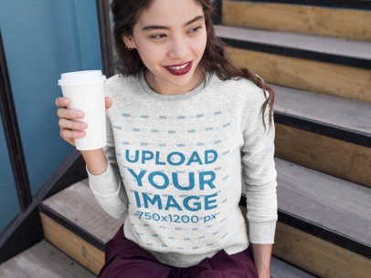 Crewneck Mockup of a Woman Holding a Paper Coffee Cup 18139