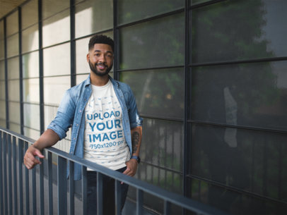 Mockup of a Man Wearing a T-Shirt and Smiling at the Camera