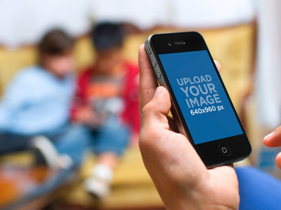 Mockup of an iPhone Featuring Kids at Home 