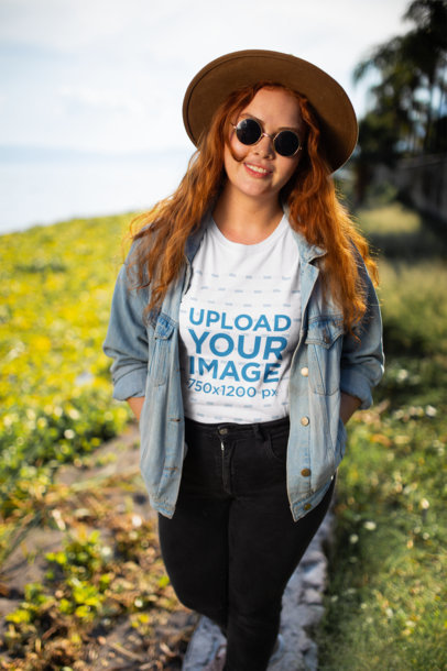 Camping T-Shirt Mockup of a Redhead Woman by the Lake