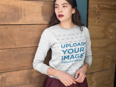 Mockup of a Woman Wearing a Sweatshirt and Looking Into the Distance 18149