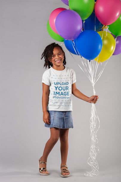 Tshirt Mockup Featuring a Happy Girl Holding Balloons